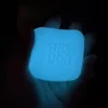 Luminous milk coffee cube Needoh squishy fidget on a desk — Image 2 of 7