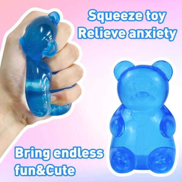 p05_71odG_djeaL_jpg_v_1782664700-1.jpg Blue NeeDoh Gummy Bear Taba Squishy jelly squeeze toy in hand