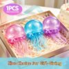 p09_813lpXGojoL_1b015c10_4307_4f7c-1.jpg NeeDoh JellySquish Sparkle Squishy – glitter dome jellyfish toy with tentacles