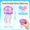 p10_715kwHGgfPL_jpg_v_1782765160-1.jpg NeeDoh JellySquish Sparkle Squishy – glitter dome jellyfish toy with tentacles