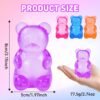 p12_71A72gH0FuL_jpg_v_1782664700-1.jpg Blue NeeDoh Gummy Bear Taba Squishy jelly squeeze toy in hand