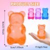 p18_71RVV_BaumL_jpg_v_1782664701-1.jpg Blue NeeDoh Gummy Bear Taba Squishy jelly squeeze toy in hand